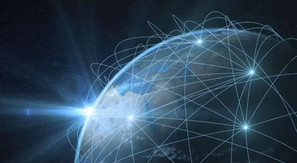 view of earth from space with glowing blue interconnected network lines around the globe